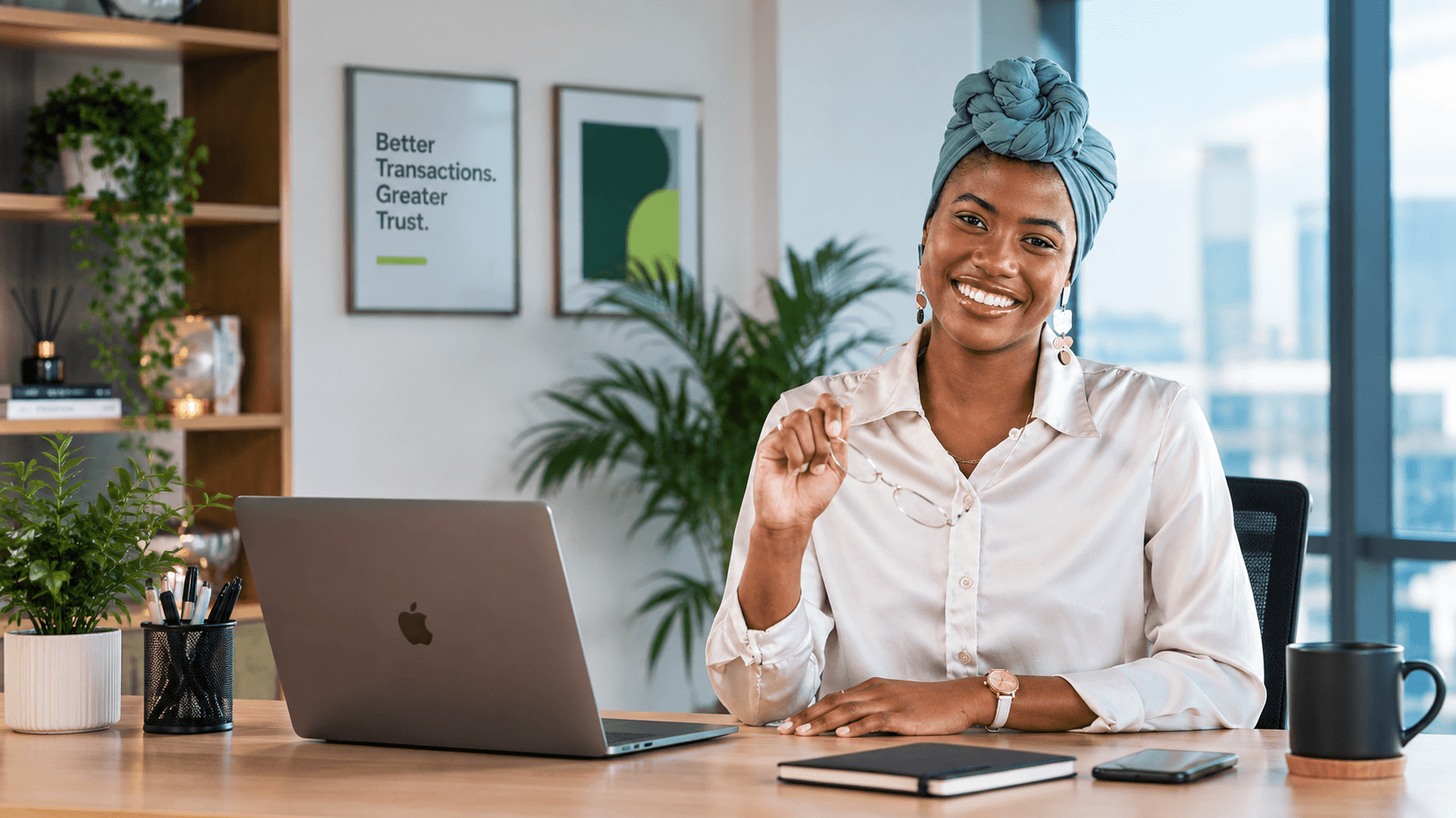 A Trust Man team member working confidently at her desk